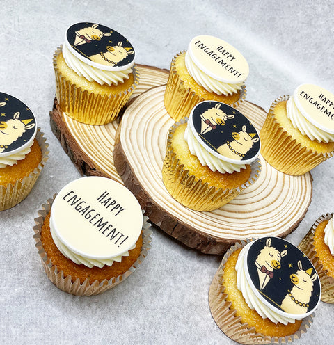 personalise cupcakes with happy engagement message and fun llama edible image.
