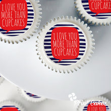 Valentine cupcakes with "Love you more than cupcakes." printed on top.