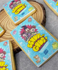 BISCUITS WITH AN EDIBLE ICED PRINT OF A BOOK COVER FOR A LAUNCH