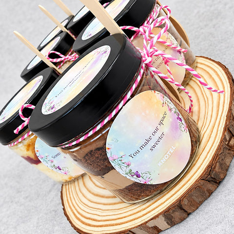 Chocolate cake jar with custom logo sticker on wooden gift stand