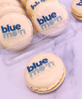 branded macarons with company logo printed onto them. 