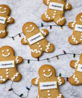GINGERBREAD MEN WITH COMPANY LOGO FOR WORKPLACE EVENTS AND EMPLOYEE TREATS. 