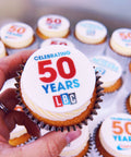 London LBC branded cupcakes with 50 years celebration message and logo
