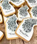BRANDED BISCUITS IN CUSTOM SHAPE FOR UK COMPANY SHOWING WOLF AND LOGO