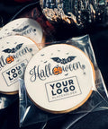 Halloween-themed cookies with customisable logo. UK delivery, shop www.printcakes.co.uk