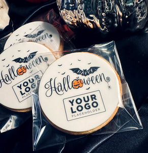 Halloween-themed cookies with customisable logo. UK delivery, shop www.printcakes.co.uk