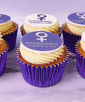 international women's day logo cupcakes with buttercream and logo topper