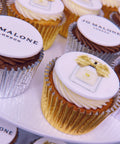 JO MALONE LONDON LOGO CUPCAKES - HALF WITH BRANDED AND HALF WITH PRODUCT IMAGE IN GOLD AND SILVER CASES