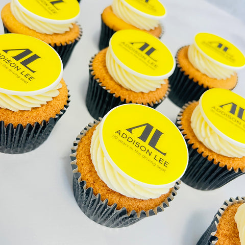 cupcakes for London delivery company with their logo in black cupcake cases