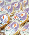 INDIVIDUALLY PACKED BRANDED BISCUITS WITH LOGOS SERVED AT COMPANY EVENT