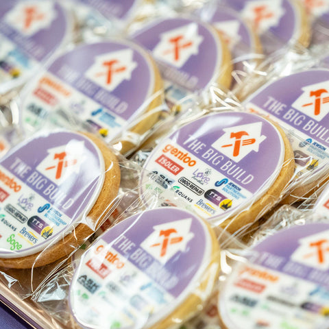 INDIVIDUALLY PACKED BRANDED BISCUITS WITH LOGOS SERVED AT COMPANY EVENT