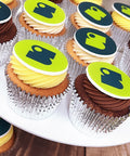 lemon , vanilla and chocolate branded cupcakes with two designs for trade show giveaway