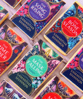 rectangle shaped biscuits for book launch with book cover graphic on icing topper for publishing house.