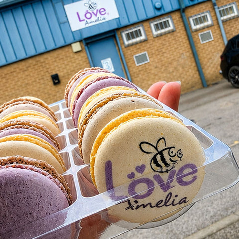 purple and white branded macarons with charity logo for Love Amelia in Sunderland