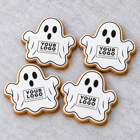 Ghost-shaped gingerbread biscuits decorated with a ghost design and your company logo.