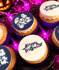 selection of halloween themed cupcakes showing a happy halloween message and a cute ghost design