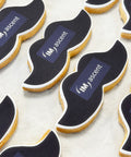 international mens day movember biscuits with company logo