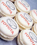 branded macarons with Toyota logo printed onto the surface for a company event