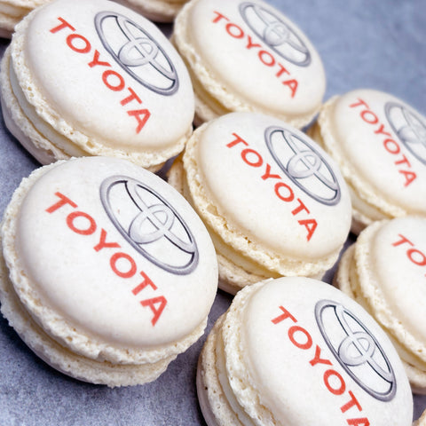 branded macarons with Toyota logo printed onto the surface for a company event