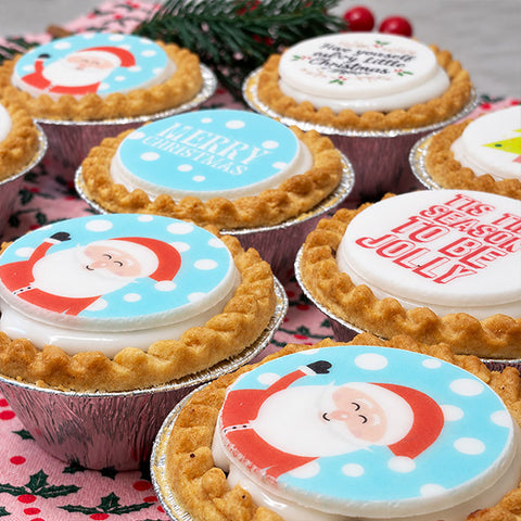 Personalised Mince pies with Merry Christmas and Santa Clause design edible iced designs. 