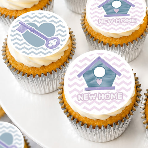 new home cupcakes with a new home design and a key design.