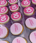 Pink happy birthday cupcakes, half with a number 10 and half with birthday message