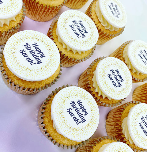 Personalised message cupcakes with Happy Birthday message edible image toppers. In gold cases.