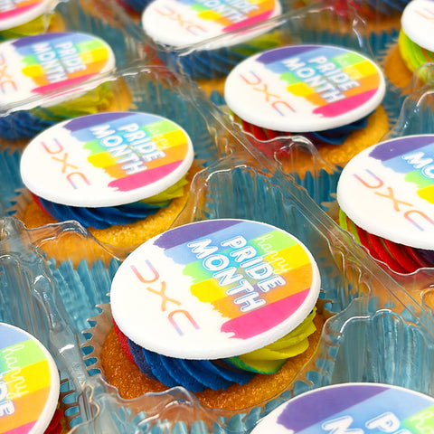 branded pride month cupcakes with rainbow buttercream for company celebration