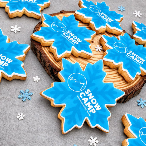 branded all butter biscuits with iced snowflake design and company logo for Christmas event. 
