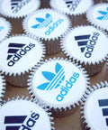 Branded logo cupcakes. Each cupcake has an edible logo printed topper.