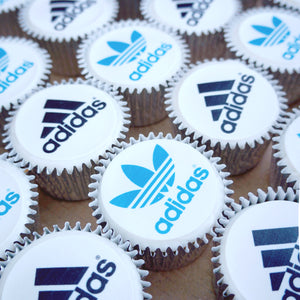 Branded logo cupcakes. Each cupcake has an edible logo printed topper.